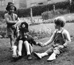 Gareth (centre) with his brother Michael (left) and cousin Frances in their grandparents' garden in Talywain.